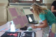 Student at the peace and justice club table